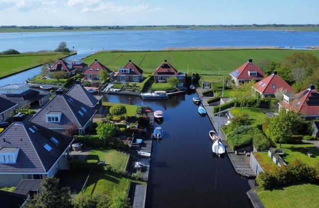 Family friendly holiday home with its own jetty and hottub.