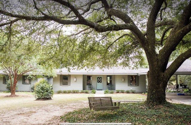 Family friendly home on 20 acres with small beach on 4 acre pond.