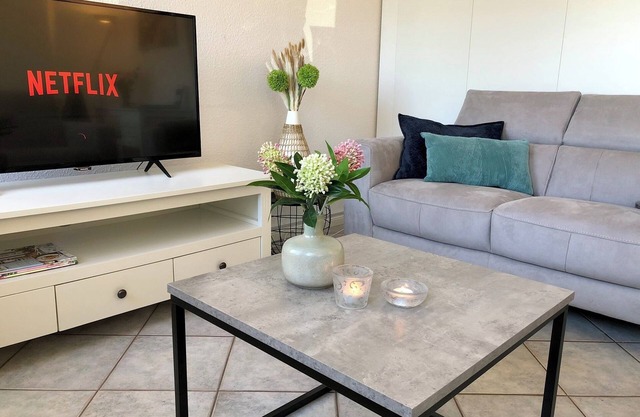 Family-friendly Krischan vacation apartment with quiet, fenced garden.