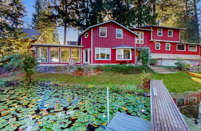 Family-friendly lakefront escape with outdoor patio dining and private dock