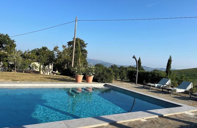 Family holiday home with great view, heated pool and pizza oven