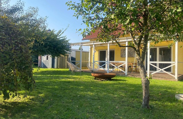 Family vacation home in the green Eifel near Nürburgring with garden and pool