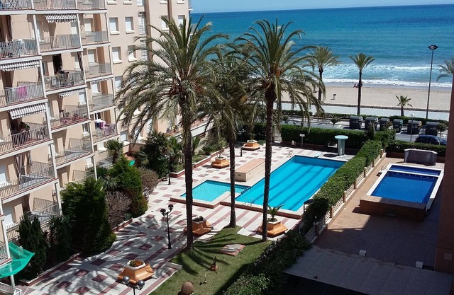 Fantastic apartment on the seafront with 2 swimming pools and garden area