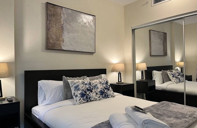 Fantastic Olympic Village 1BR+Den with A/C