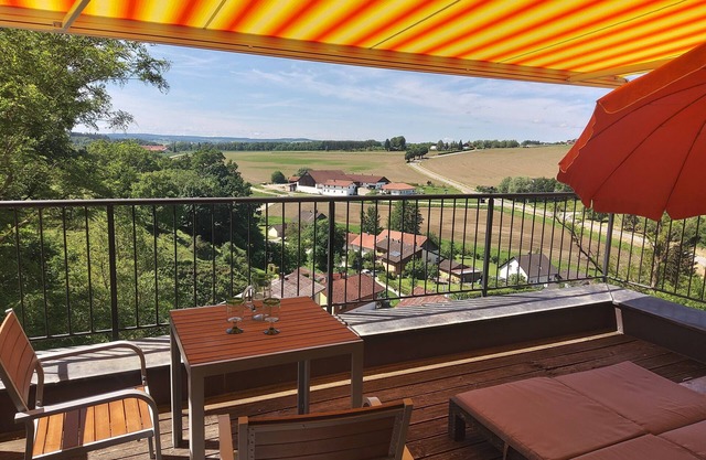 Far-reaching views and pool - ideal for golf and wellness
