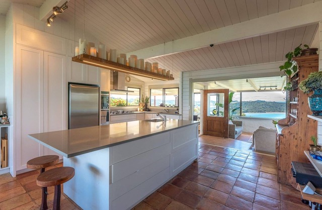 Farm house with 360 degree views over the Hauraki Gulf .