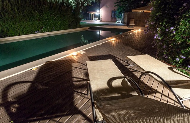 Farmhouse with pool between oranges and lemons trees