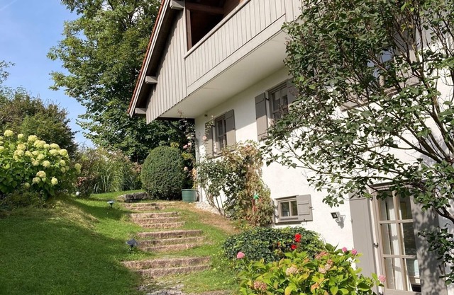 Feel-good holiday home by the stream with a large garden and Brauneck mountain view