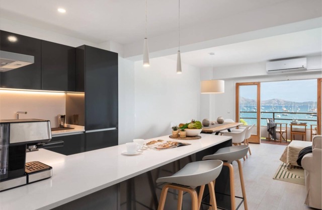 Feel the sea breeze in this stylish beachfront apartment