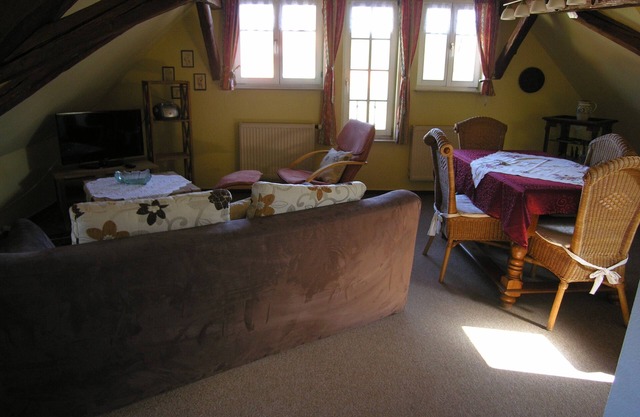 Ferienwohnung im Dach für zwei mit rustikalen Charme und Blick zum Wehrgang.