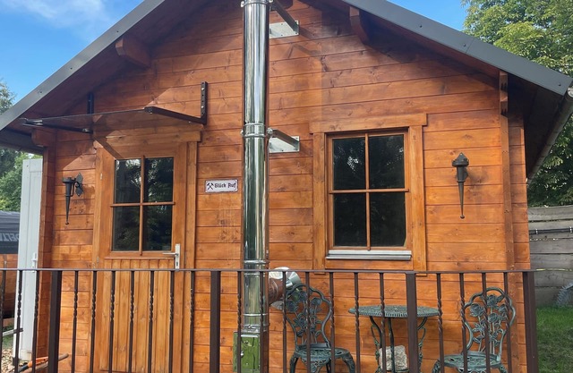 Feriengarten-im-Erzgebirge wooden house in Lugau with playground family vacation ERZ