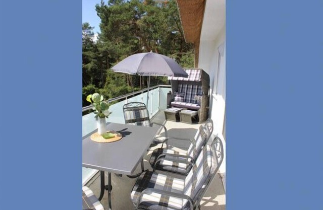 Ferienwohnung mit Balkon in Einem Reetdachgedecktem Strandhaus