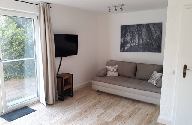 Ferienwohnung 60 qm im Untergeschoss/Hanglage mit 1 Schlafzimmer und Terrasse