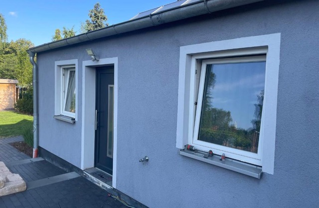 Ferienwohnung mit Fußbodenheizung nahe Messe, gratis Parkplatz und Abstellplatz E - Bike