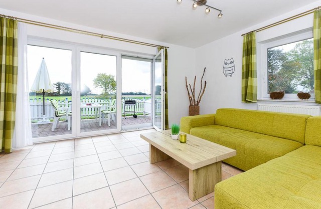 Ferienwohnung Muschel 1 mit Terrasse und Garten, Bensersiel