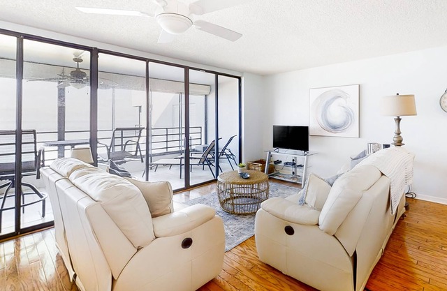 Fifth floor oceanfront condo w/ pool access, ocean view, W/D, WiFi, & central AC