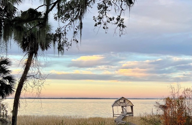Find peace & recharge at this 2 bedroom 2 bathroom home on beautiful Lake Harris