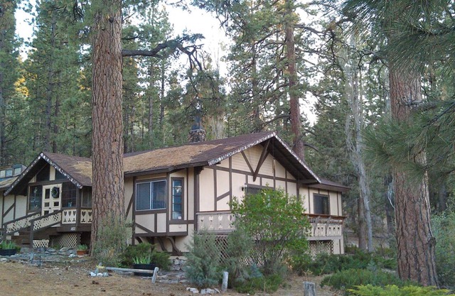 FIND TRUE SECLUSION IN OUR PEACEFUL CHALET. 5 ACRES, TRAILS, TREES & SPA