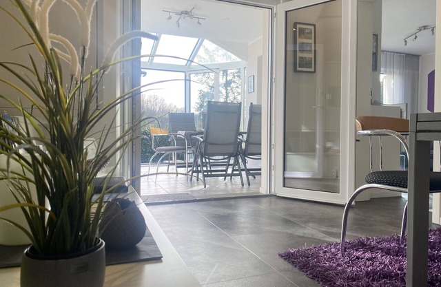 First class apartment with a beautiful view, winter garden, garden, and much more.