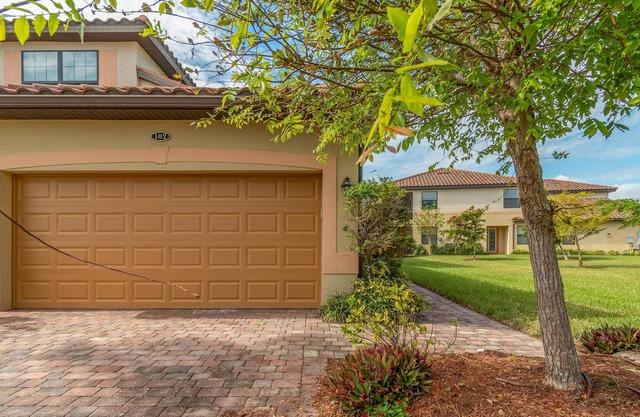 First Floor Coach Home in Gated Community