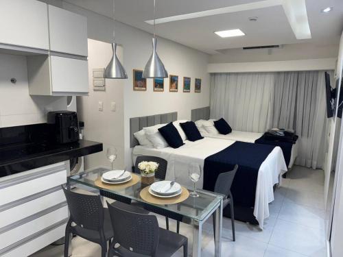 Flat com piscina a 50m da praia
