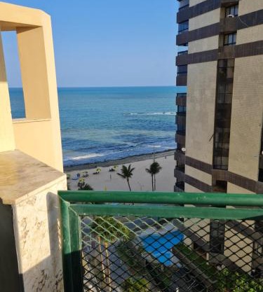 Flat Pé na areia