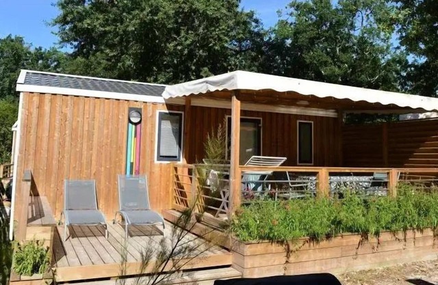 Flower Camping La Canadienne * - PREMIUM CLIM mobile home 28m² - 2 bedrooms + semi-covered terrace + TV + sheets + towels included 5 people