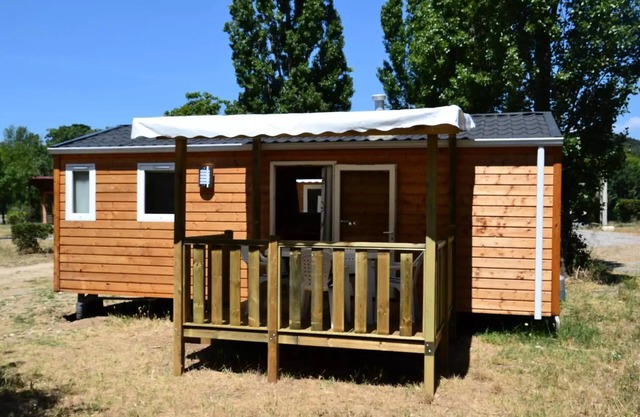 Flower Camping Olivigne * - Mobil home Comfort 2 bedrooms 28m2 + terrace 9m2 + air conditioning + TV 4 people