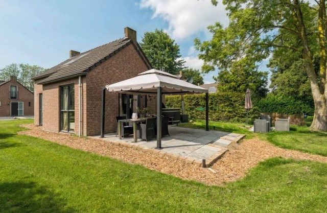 Forest Cottage Ewijk incl. hot tub by Interhome