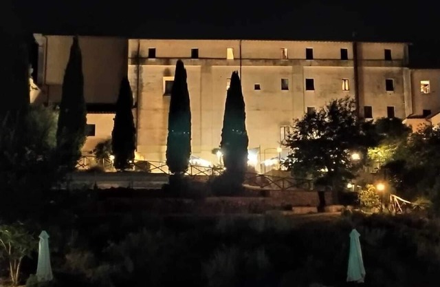 Former monastery surrounded by greenery with bright apartments, swimming pool, restaurant