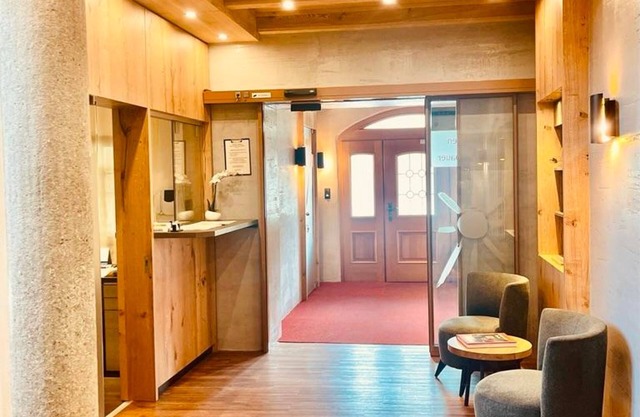 Four-bed room - Hotel Sonnenhof Igls