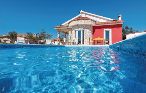 Four-Bedroom Holiday Home In Cista Velika