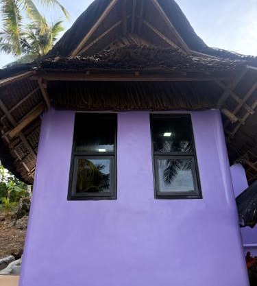 Free Breakfast and coffee for 2 Purple Beach House