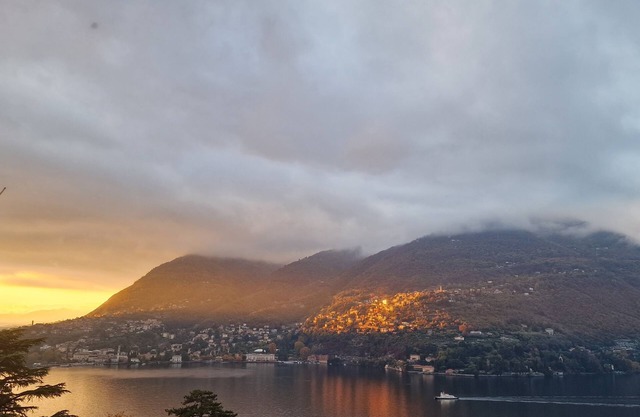 From the apartment and terrace view of the Lake, and with private parking space