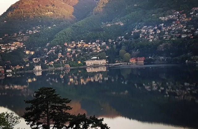 From the apartment and terrace view of the Lake, and with private parking space