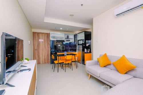 Fully Furnished and Homey 1BR Apartment at Pejaten Park Residence By Travelio
