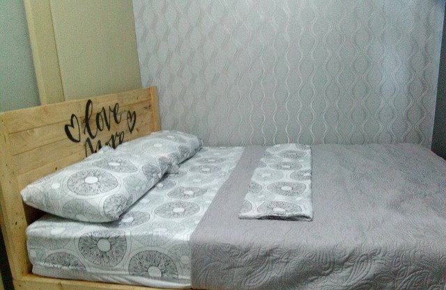 Fully Furnished Condo Across SM Mall with Unli WIFI and QUEEN BED size