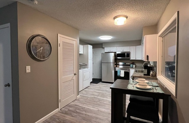Fully updated duplex across from the park with walking trail!