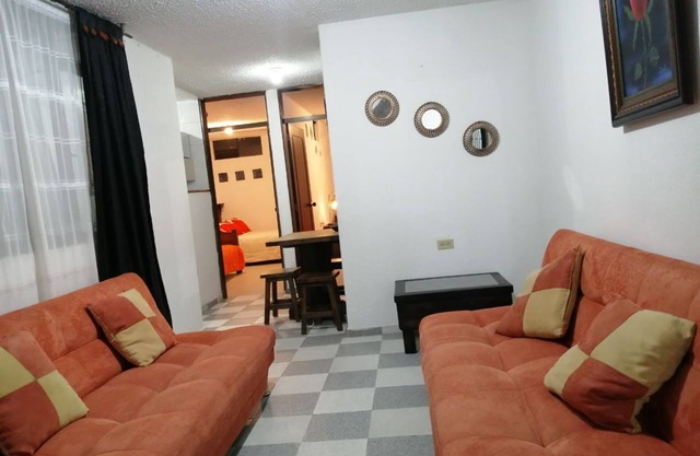 Furnished apartment near the airport located close to commercial areas.