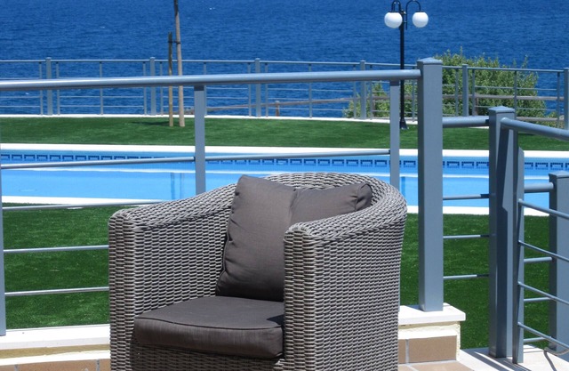 garden level apartment with full sea views in residence with swimming pool.
