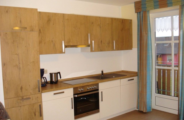 Gemütliche 70qm Ferienwohnung mit Balkon, Naturholzmöbelausstattung