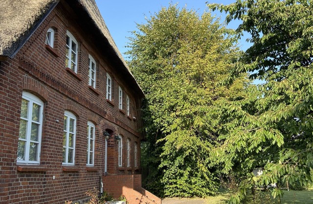 Gemütliche Ferienwohnung im Erdgeschoss eines Reetdachhauses mitten im Grünen
