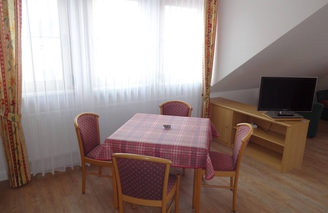 Gemütliches Ferienappartement mit Blick auf die Liegewiese Richtung Main