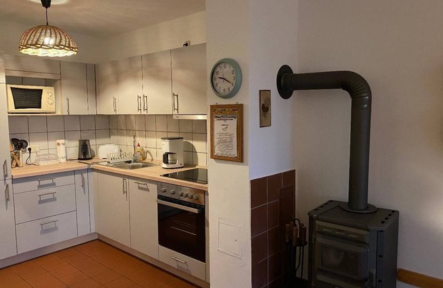 Gemütliches Ferienhaus mit Holzsauna, Holzkaminofen und Garten