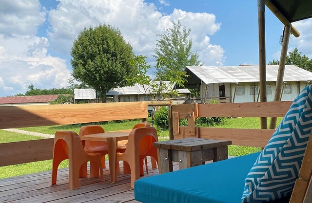 Glamping 'Safarilodge Confort Tent 8 5 Pers' with Shared Pool, Private Terrace and Wi-Fi