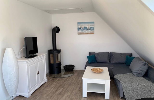 Goldblick apartment with wood-burning stove, garden and proximity to the sandy beach on Fehmarn