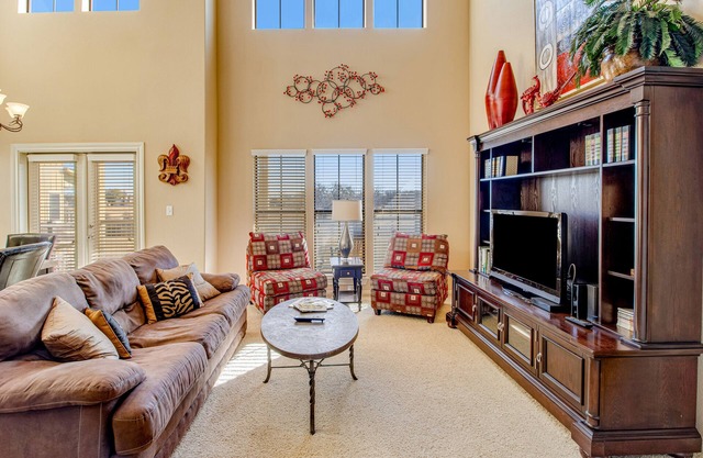 Golf-course getaway with fairway views, pool, WiFi, & central AC
