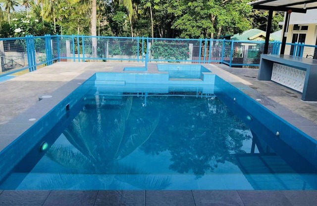 Gorgeous Samal Island Home with pool, basketball court - near Ferries & resorts!
