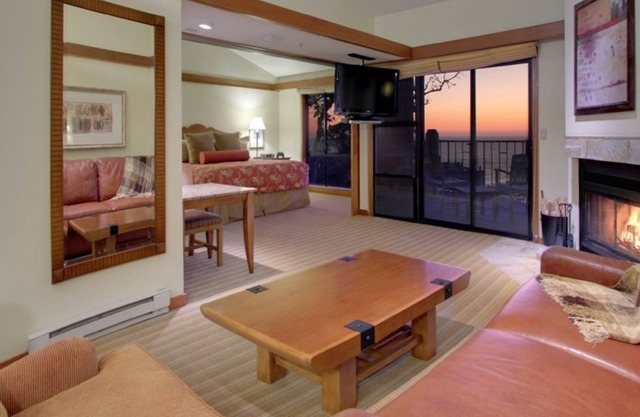 Gorgeous 1-bedroom residence with a private ocean-view balcony and a fireplace.