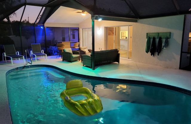 Gorgeous 3 Bedroom 2 Full Bath House with Heated Inground Pool and Lanai !